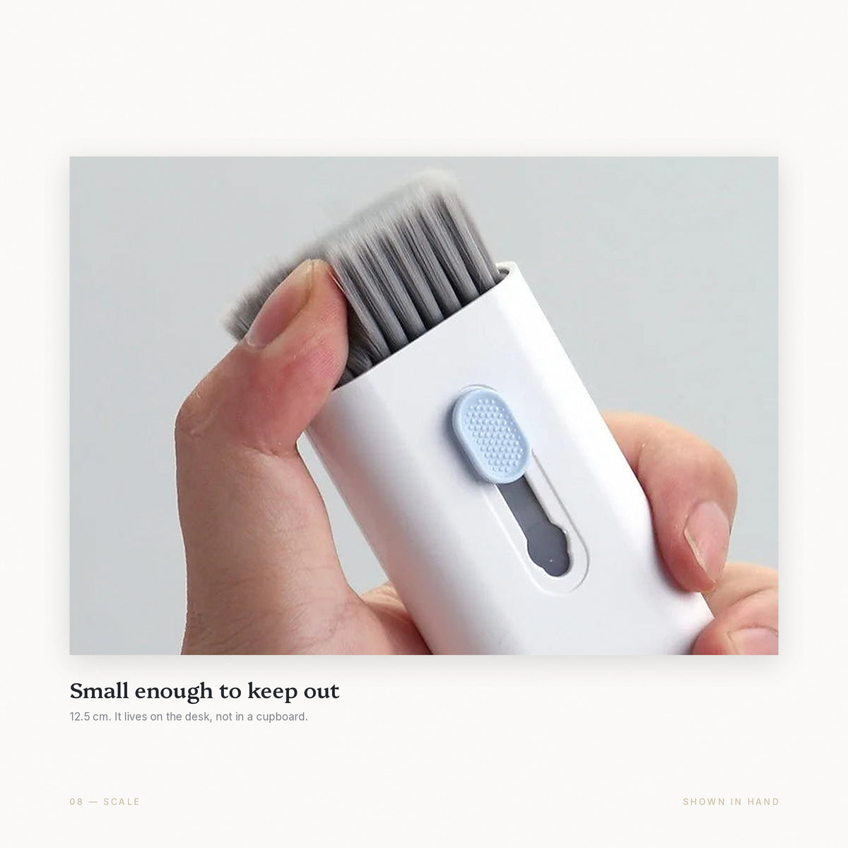 The Reset Kit held in one hand, showing how small it is