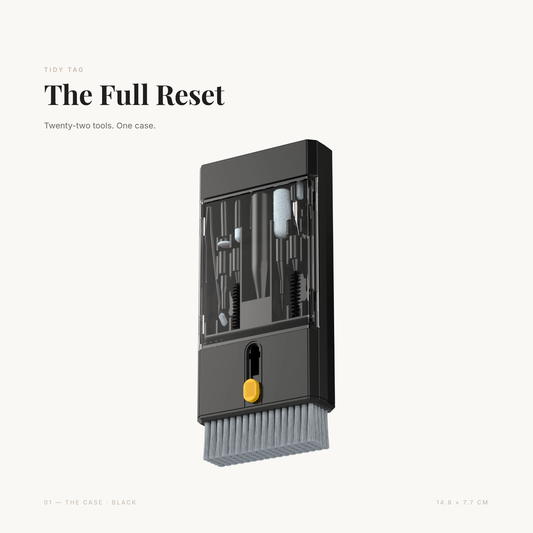 The Full Reset in black — the 22-in-1 cleaning kit case, closed, with the brush head extended